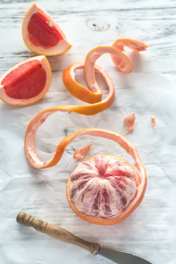 Peeled grapefruit on the table